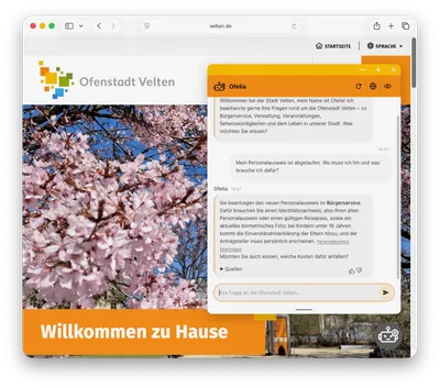 Screenshot der Webseite der Stadt Velten mit einem Chatfenster des Chatbots Ofelia, der Fragen zum Personalausweis beantwortet, vor einem Hintergrundbild blühender Kirschzweige und einem orangefarbenen Banner mit dem Text 'Willkommen zu Hause'